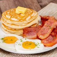 Hotcake with bacon and egg