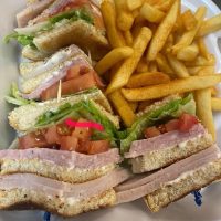 Club sandwich with fries